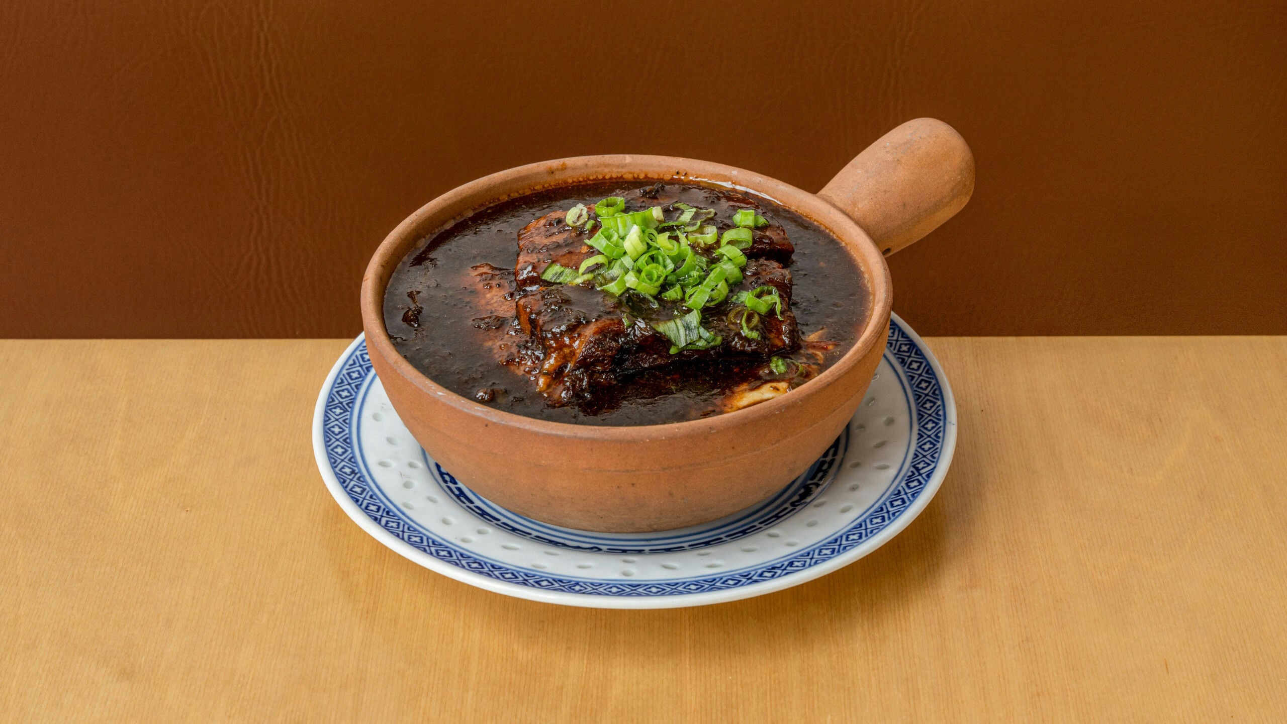 Sliced Pork Belly on Pickled Mustard Green